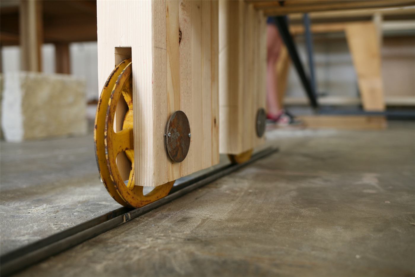 Bus Bench — the rolling bench acting as canopy counterweight