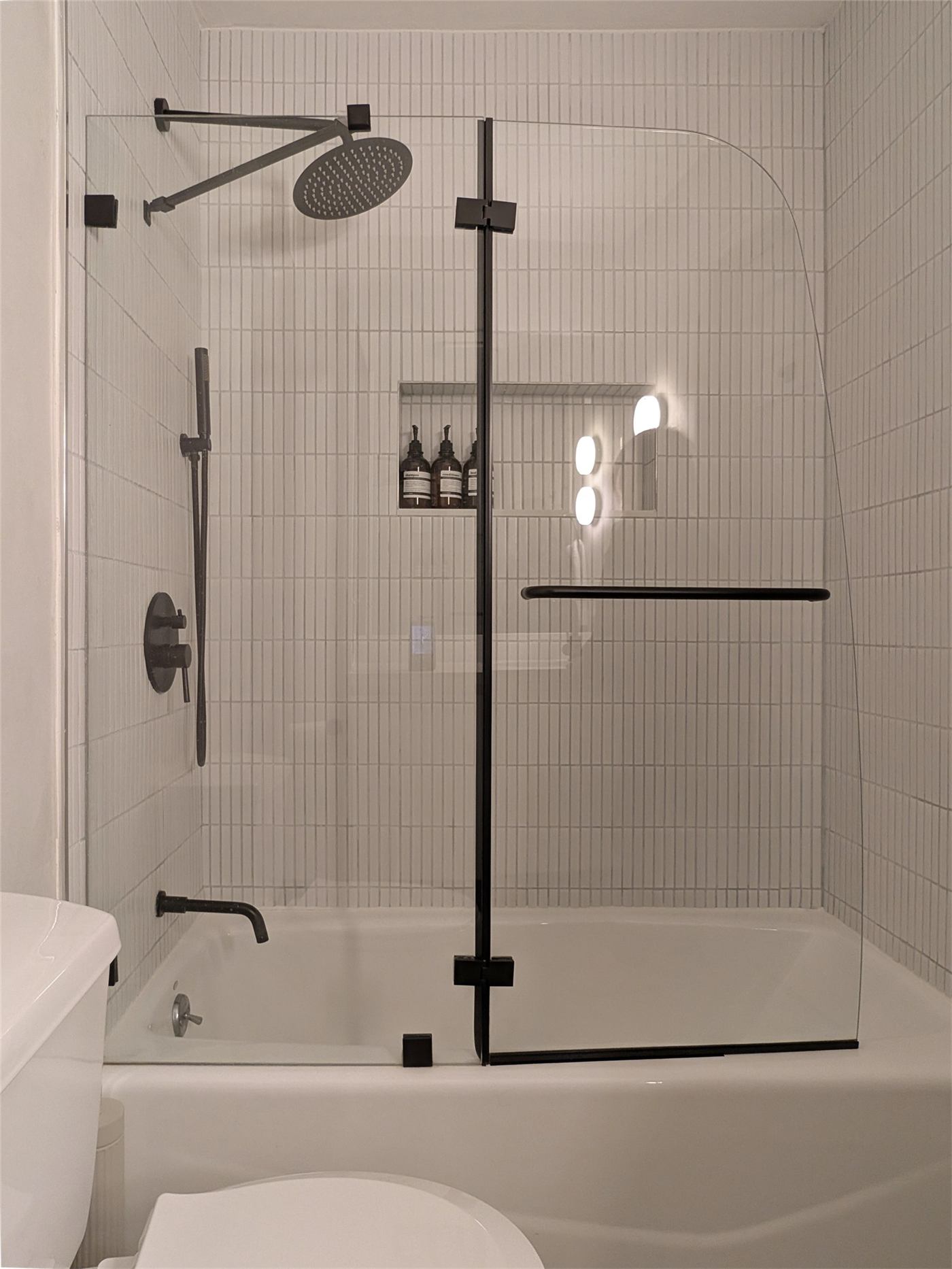 Bathroom No. 1 — shower and updated fixtures in the 40-square-foot bathroom
