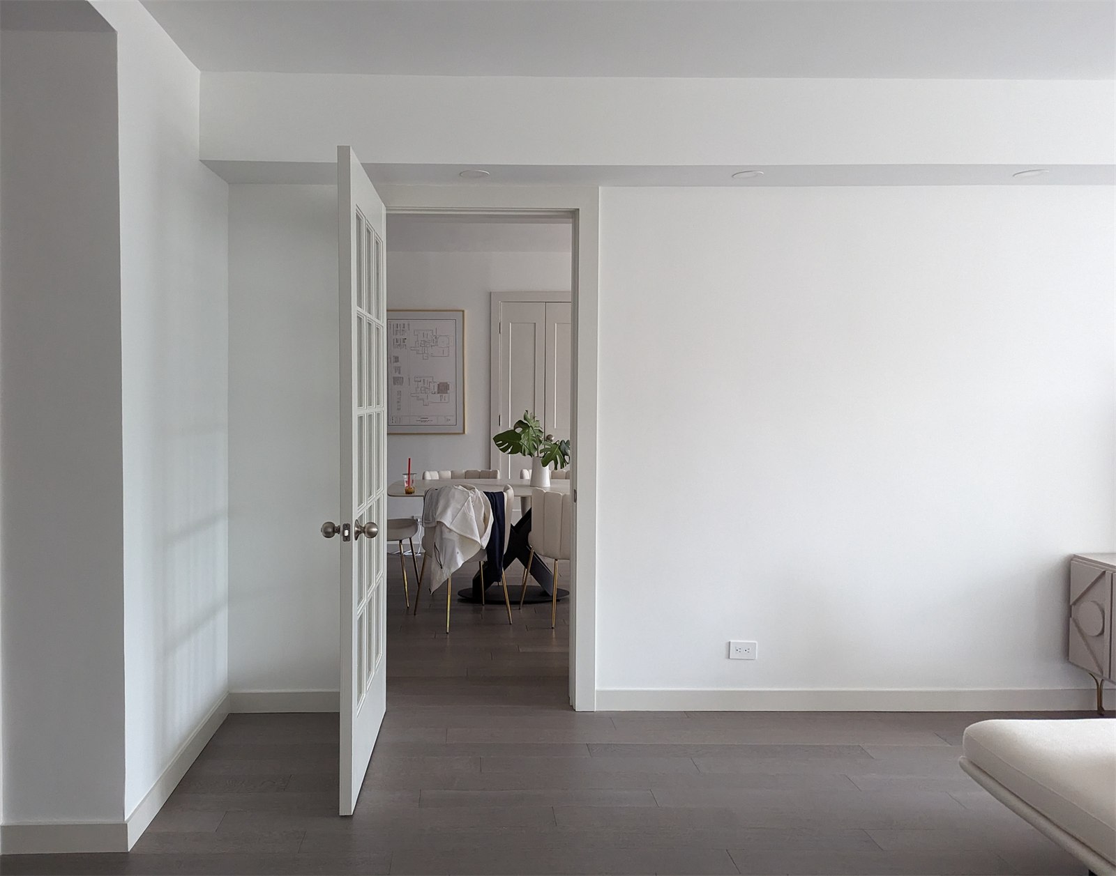 Condo No. 1 — French door opening joining two condo living spaces
