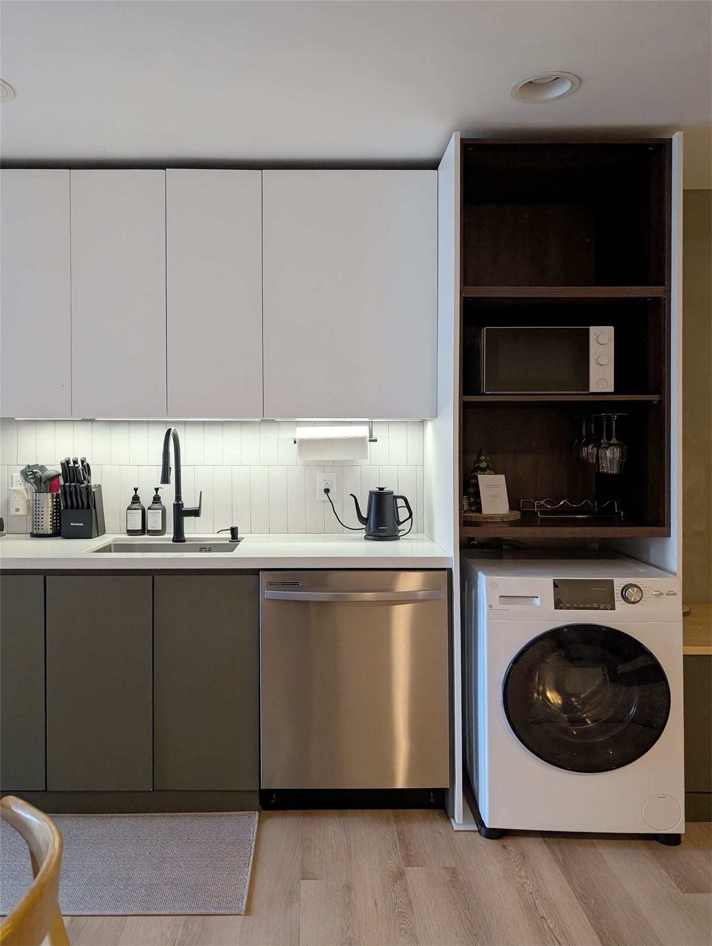 Kitchen No. 1 — green base cabinets and continuous built-in millwork wall