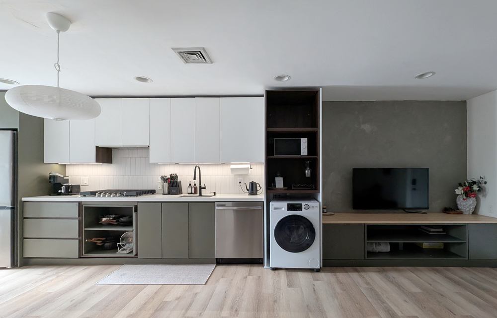Kitchen No. 1 — relocated sink opening up the floor plan of the narrow room