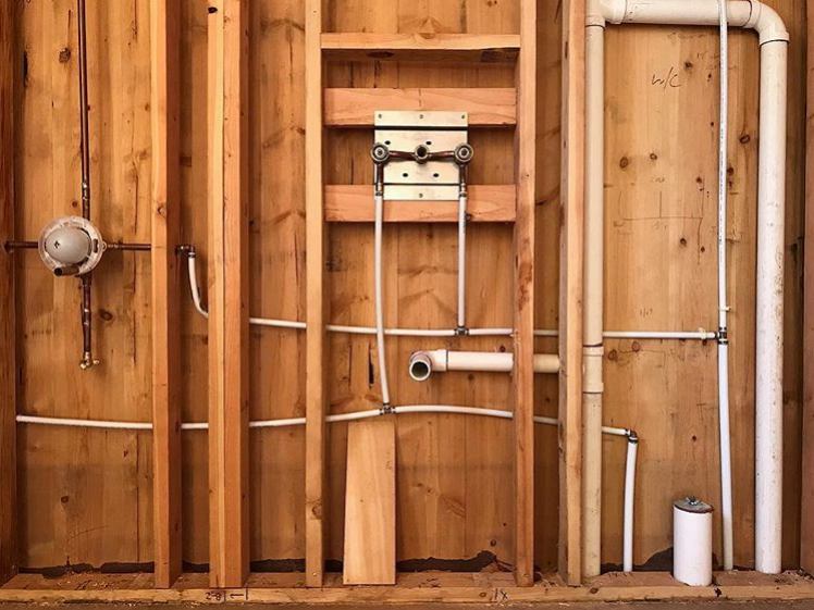 Building Project 2018 — students installing plumbing rough-in